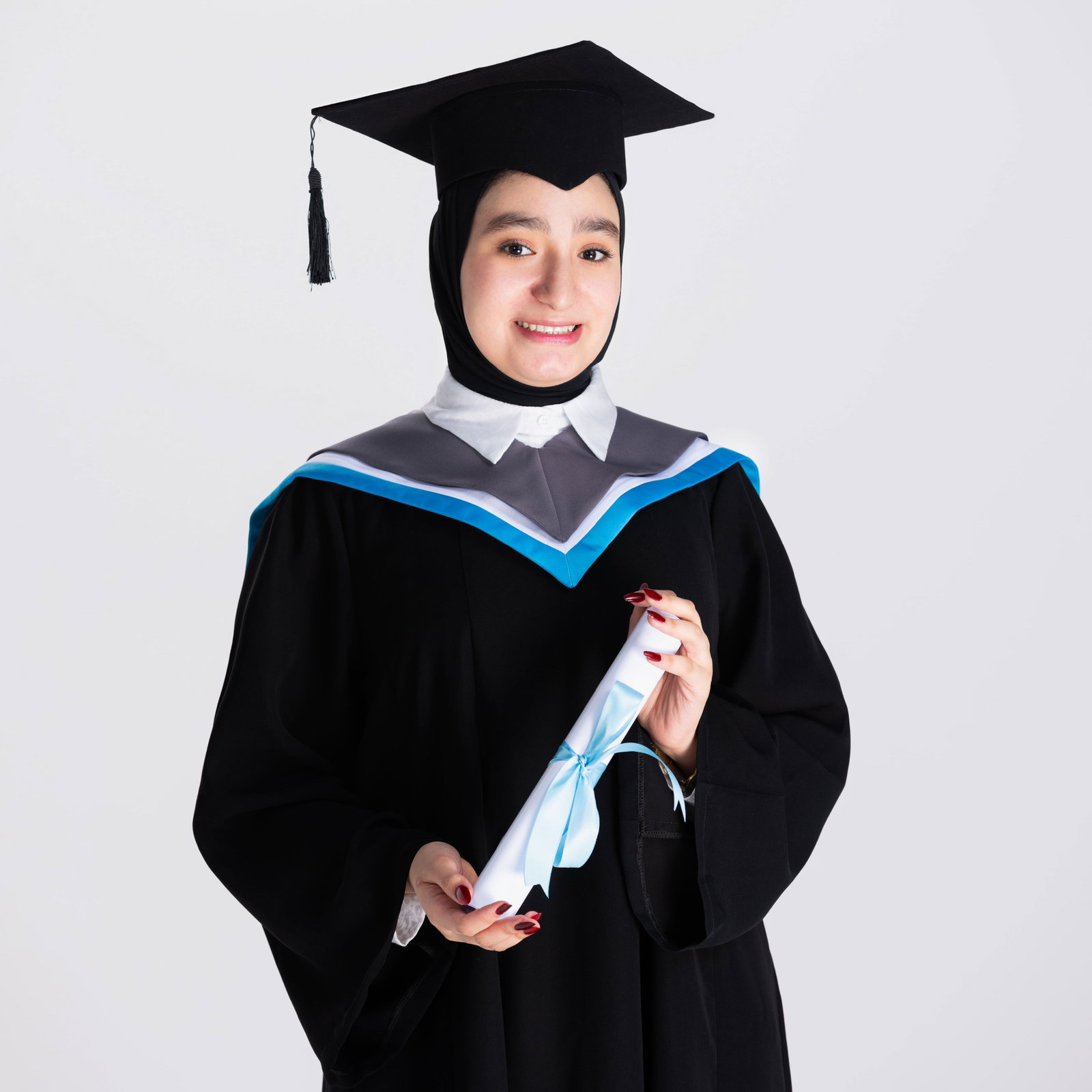 young-graduate-student-making-thumbs-up-white